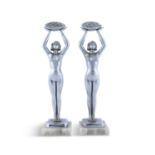 A PAIR OF ART DECO CHROME PLATED SPELTER NUDE FIGURES, by Limousin, on quartz bases, signed. 36cm