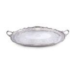 A FINE 19TH CENTURY SILVER PLATED OVAL TWO HANDLED REGIMENTAL SERVING TRAY, the reserve engraved