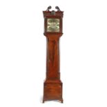 A GEORGE III IRISH CHIPPENDALE MAHOGANY LONGCASE CLOCK, the carved hood with broken pediment and