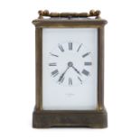 AN EDWARDIAN BRASS CASED REPEATER CARRIAGE CLOCK, with white enamel dial and Roman numerals,