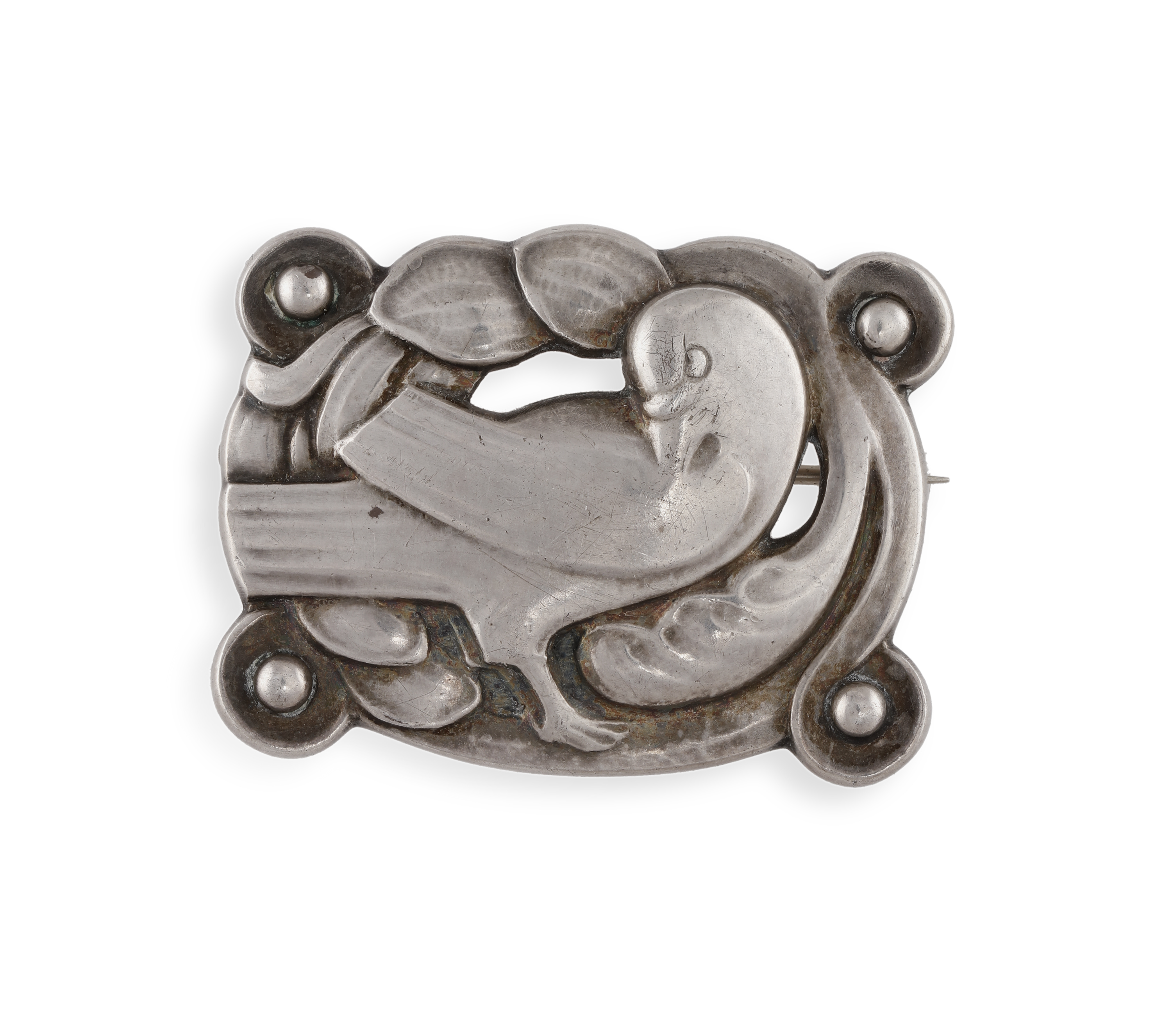 A SILVER BROOCH BY GEORG JENSEN, CIRCA 1945-51, the stylised rectangular-shaped frame enclosing a