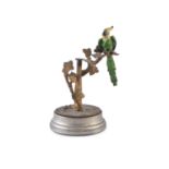 AN AUSTRIAN COLD PAINTED BRONZE MODEL OF A PARROT, perched on a branch of tree stump and raised on a