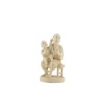 A JAPANESE CARVED IVORY GROUP, Meiji period (1868- 1912), humorously carved as a man seated with a