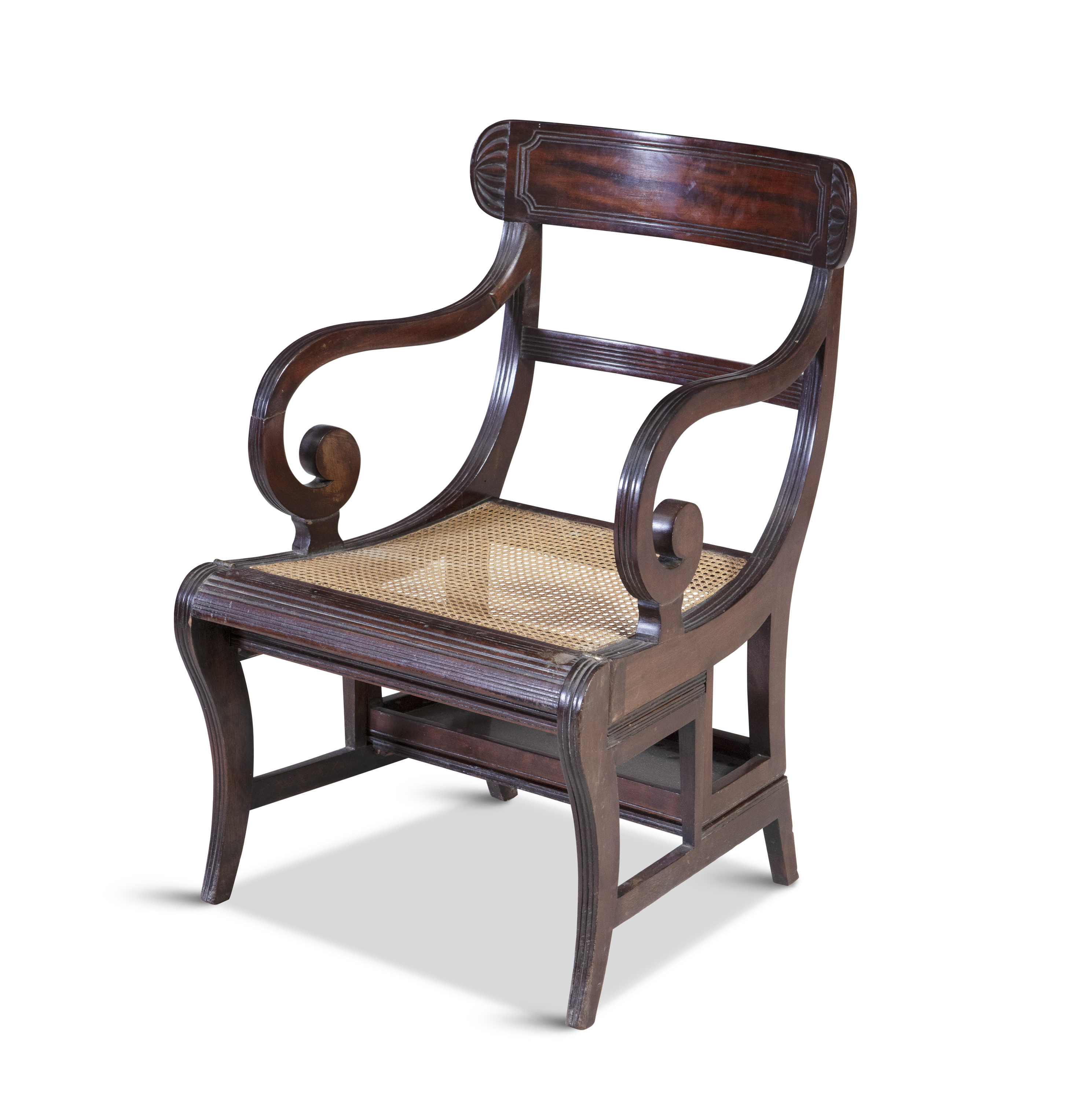 A REGENCY MAHOGANY METAMORPHIC LIBRARY CHAIR / LIBRARY STEPS, after a design by Morgan & Sanders,