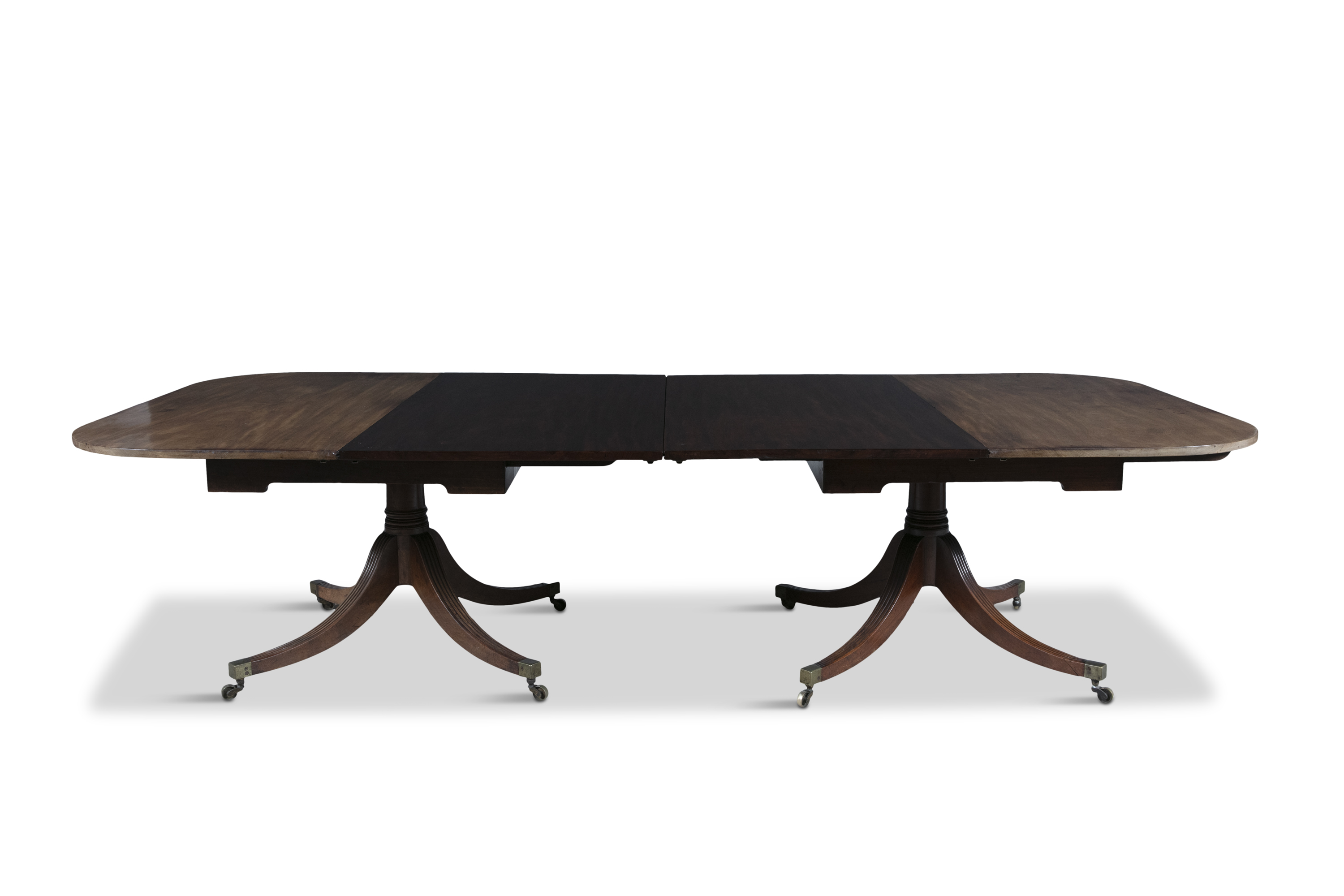 A GEORGE IV MAHOGANY EXTENDING DINING TABLE, of rectangular form, having slightly curved ends and - Image 2 of 2