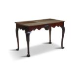 AN IRISH GEORGE III MAHOGANY RECTANGULAR SIDE TABLE, 19th century, with moulded rim above a shaped
