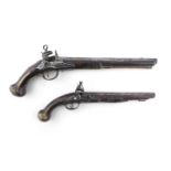 TWO 18TH CENTURY WALNUT AND BRASS MOUNTED FLINTLOCK PISTOLS, one signed Vincenzo Mariano