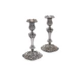 A PAIR OF GEORGE III SILVER TABLE CANDLESTICKS, Sheffield c.1773, mark of John Winter, each with