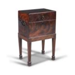 A 19TH CENTURY INLAID MAHOGANY RECTANGULAR CELLARETTE, the lift top with boxwood stringing and