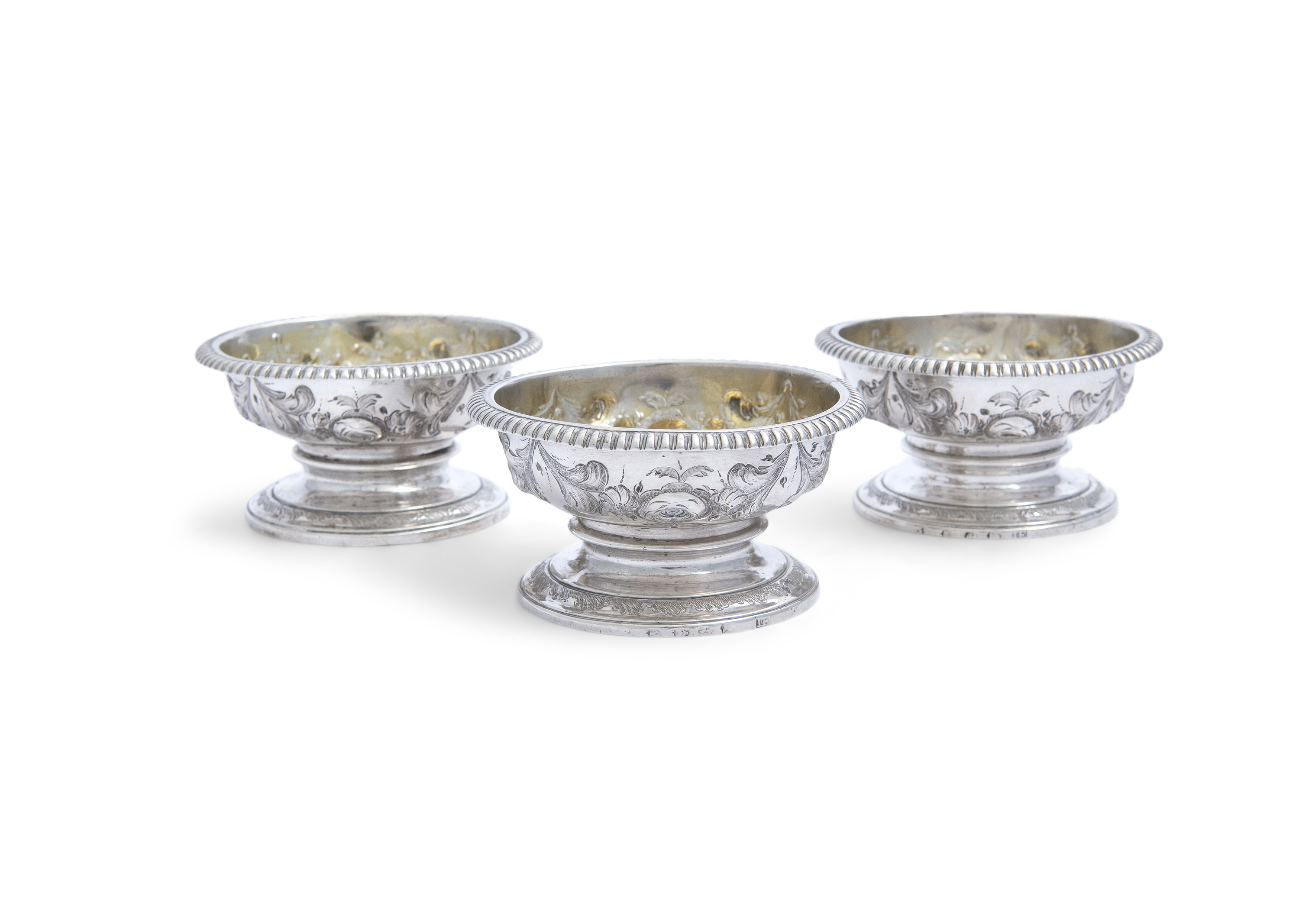 A SET OF THREE GEORGE III IRISH SILVER OPEN SALT CELLARS, Dublin c.1771, maker's mark of James Fray,