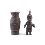 AN AFRICAN BRONZE FIGURE OF A TRIBAL MAN; together with a wicker vase