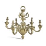 A CAST BRASS SIX-BRANCH CEILING LIGHT, the acanthus corona below a baluster column with reeded