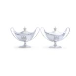 A PAIR OF GEORGE III IRISH NAVETTE SHAPED SILVER SAUCE TUREENS AND COVERS, Dublin c.1794, maker's