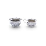 AN EDWARDIAN SILVER CREAM JUG AND MATCHING SUGAR BOWL, Sheffield c.1906 & Chester c.1907, mark of