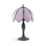 AN ART NOUVEAU STYLE BRONZED METAL TABLE LAMP, the circular baluster column of organic form raised