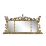 A 19TH CENTURY CARVED GILTWOOD COMPARTMENTED OVERMANTLE MIRROR, the frame surmounted with stylised