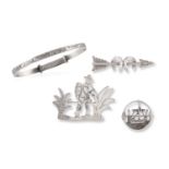 A GROUP OF SILVER JEWELLERY, including 3 brooches, one designed as a horseshoe, one sailing ship and