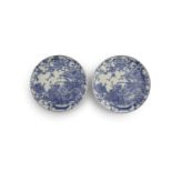 A PAIR OF JAPANESE BLUE AND WHITE CABINET PLATES, 19th century, each of circular shape, decorated
