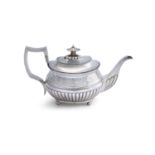 A REGENCY SILVER OVAL TEAPOT, London 1812, marker's mark rubbed, with pagoda finial and gadroon