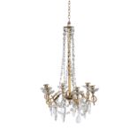 A SMALL BRASS FRAMED SIX BRANCH CHANDELIER, hung with facetted downswept beaded icicle drops, joined