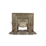 A VICTORIAN BRASS FIRE SURROUND AND FENDER, 19th century, of rectangular outline, applied with