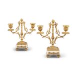 A PAIR OF 19TH CENTURY ORMOLU AND WHITE MARBLE TWO LIGHT CANDELABRA, the centre pillars surmounted