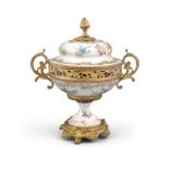A DRESDEN PORCELAIN AND GILT METAL MOUNTED URN AND COVER, 19th Century, surmounted with acorn