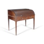 A GEORGE III MAHOGANY TAMBOUR FRONT DESK, C.1800, the roll top enclosing a fitted interior of pigeon