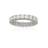 A DIAMOND ETERNITY RING, set with round brilliant-cut diamonds throughout weighing approximately 1.