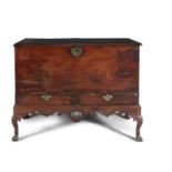 AN IRISH GEORGE III MAHOGANY BLANKET CHEST ON STAND, the rectangular body with solid hinged cover,