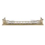 A VICTORIAN BRASS FENDER IN NEOCLASSICAL STYLE, with baluster turned corner finials and pierced side