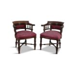 A PAIR OF MAHOGANY FRAMED TUB-BACK LIBRARY CHAIRS, 19th century, each with curved back rail and