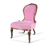 A VICTORIAN MAHOGANY FRAMED AND UPHOLSTERED OCCASIONAL CHAIR, with waisted back, upholstered in pink