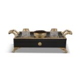 A FRENCH EBONISED AND ORMOLU MOUNTED INKSTAND, 19th century, of rectangular shape, fitted with a