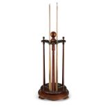 A 19TH CENTURY MAHOGANY BILLIARDS POOL CUE STAND, the solid central column with turned globular