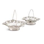 A PAIR OF GEORGE III WIREWORK SWEET MEAT BASKETS, London 1768 by William Pitts, each of oval form