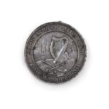 A RARE AND EARLY GAA MEDAL, c.1885, the obverse finely decorated with Irish motifs of harp, round