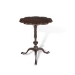 A LATE 19TH CENTURY MAHOGANY PIECRUST WINE TABLE, the shaped circular top with lobed edge, on a