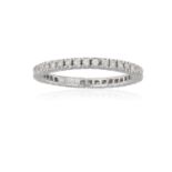 A DIAMOND ETERNITY RING, set with a continuous row of brilliant-cut diamonds, ring size L