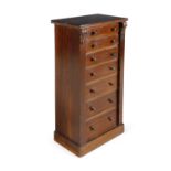 A WILLIAM IV ROSEWOOD WELLINGTON CHEST, of upright form, set with seven short graduated drawers,