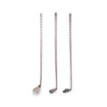 THREE SILVER SWIZZLE STICKS / STIRRERS IN THE FORM OF GOLF CLUBS, each 21cm long