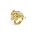 A GOLD AND DIAMOND RING, realistically modelled as a ram's head, of swirling openwork textured gold,