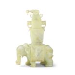 A CHINESE PALE JADE MODEL OF AN ELEPHANT WITH CARRIAGE AND COVER, the detachable top with carved