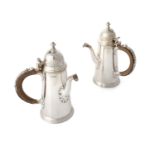 A PAIR OF SILVER CHOCOLATE POTS, Birmingham 1919, mark of Robert Chandler, of tapering cylindrical