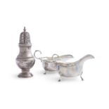 TWO EDWARDIAN SILVER SAUCE BOATS, Birmingham 1906 and 1908, one with cast border, 15cm wide, the