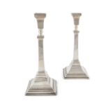 A PAIR OF SILVER CANDLESTICKS, Birmingham 1932/33, mark of Britton, Gould & Co., of neoclassical