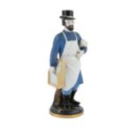 A RUSSIAN 'GARDNER' PORCELAIN FIGURE OF A GLAZIER, Moscow 19th century, modelled as a bearded man