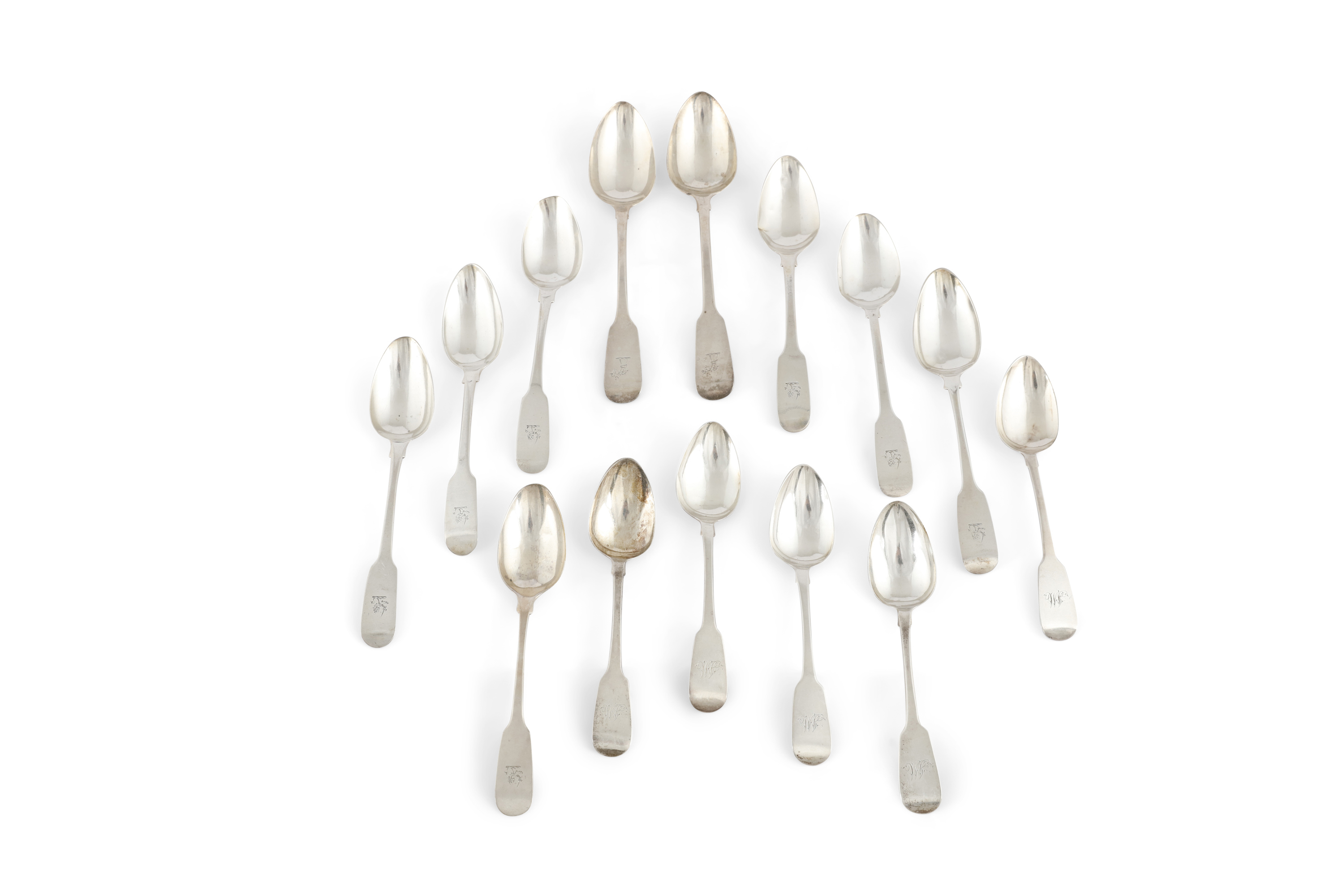 A MATCHED SET OF SEVEN IRISH GEORGIAN SILVER PLAIN FIDDLE PATTERN DESSERT SPOONS, Dublin 1805-