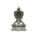 A 19TH CENTURY ROCOCO REVIVAL FRENCH PORCELAIN MANTEL CLOCK ON STAND, with gilded pagoda finial