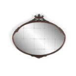 A NEOCLASSICAL STYLE OVAL WALL MIRROR, 110cm wide, 67cm high; together with an inlaid mahogany and